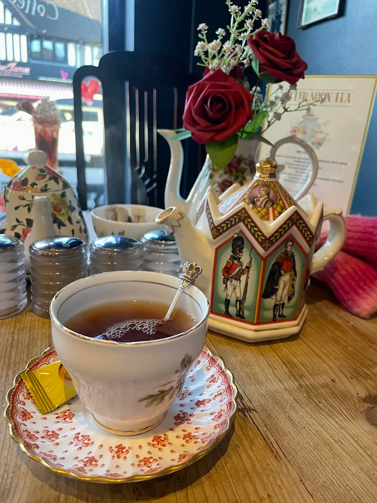 Mismatched vintage teapots and chinaware
